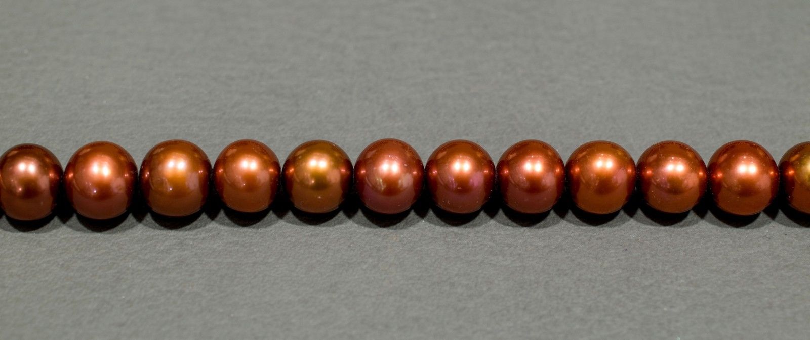 Perlenstrang Rostbraun rund mit hohem Lüster in 6-7 mm